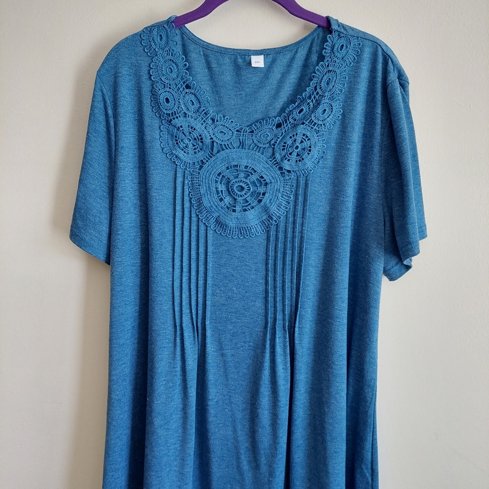 Unknown 2x blue top